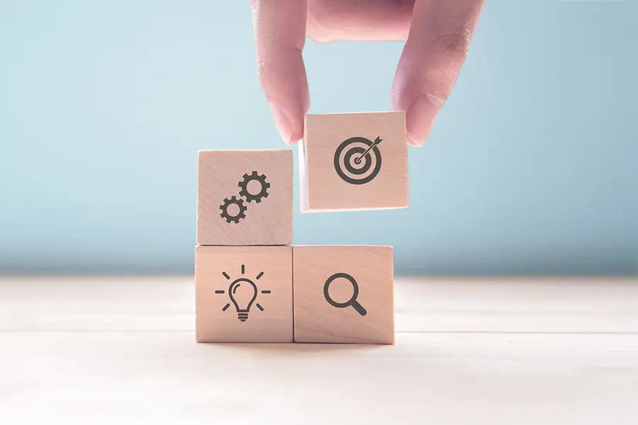 stacked wooden blocks with icons